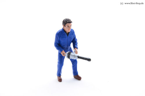 Worker with pneumatic hammer